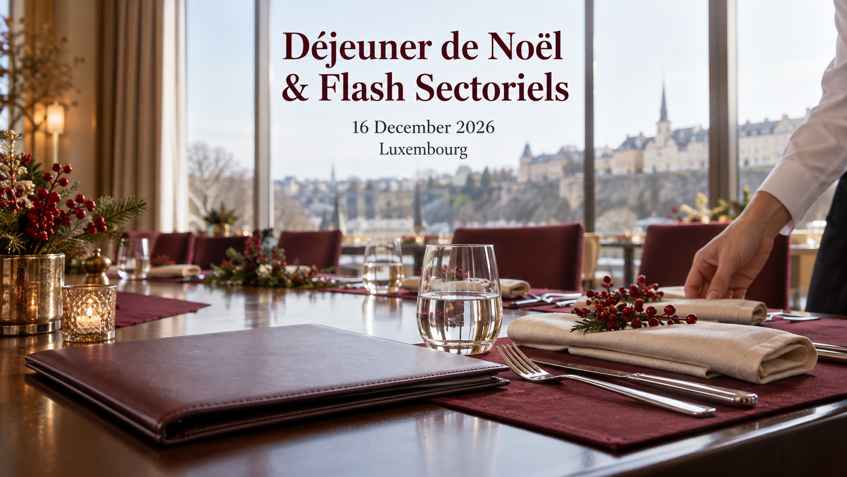 A hotel lunch place setting with a business folder, glassware and winter foliage.